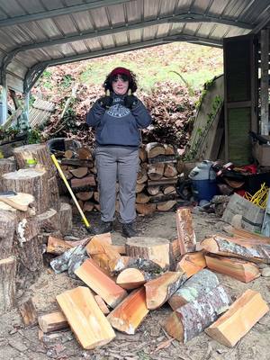 A post by @lumberjess on TikTok caption: Smash or pass except its me deciding if wood is small enough to fit in the woodstove #pnw #pnwlife #woodchopping #lumberjack #woodisgood #smashorpass 