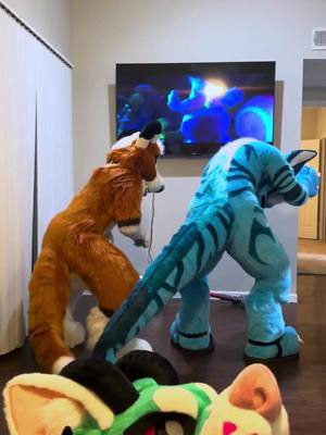 A post by @worm_soup on TikTok caption: Teaching this dragon how to wag his tail! Say hi to Xilinx! #furry #fursuit #furryfandom #furries #fursuiter 