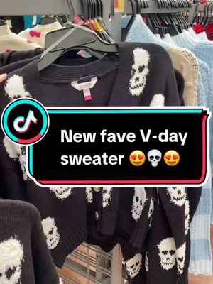 A post by @thathalloweenfamily on TikTok caption: Spotted this beauty on my way out and couldn’t leave without! 😍💀 In love, perfect Valentines sweater! Walmart has been stepping their game up!👏 #valentinesdaysweater #spookyvalentine #skeletonsweater #walmartfinds 