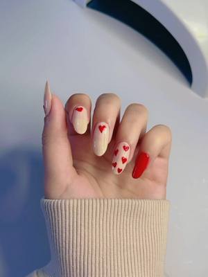 A post by @hanankamal21 on TikTok caption: day 1/14 ♥️ inspo from pinterest!! #valentinesdaynails #nailinspo #fyp 