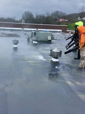 A post by @freedom_to_shoot on TikTok caption: #leafblower #water #rain #roofing #commercialroofing #badweather #foryou #fyp #viralvideo #work 