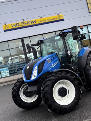 A post by @wrshawltd on TikTok caption: One of our New T5.120 Dynamic Commands in stock ,with front and rear suspension ,3 spools, 440/65R28 front and 540/65r38 rears ,really nicely specced tractor ,for more info call us on 0579361488 ,as you can see a full range of tractors ,new ,used and low  hour exhire tractors ready to go ,          #wrshaw #thetractorpeople #newholland #irishagriculture #irishagri #agriisourculture 