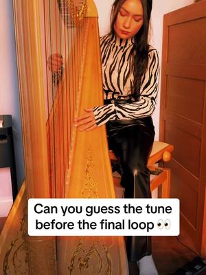 A post by @harpistkari on TikTok caption: Excuse the concentration face I only had like 10 minutes to do this 🤪🎶 #looppedal #coversong #harp 