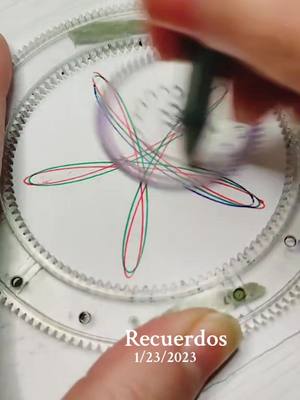 A post by @nemrakiram on TikTok caption: #Recuerdos #fyp #spirographdrawings #spirograph #espirografo #spirographart #asmrsounds 