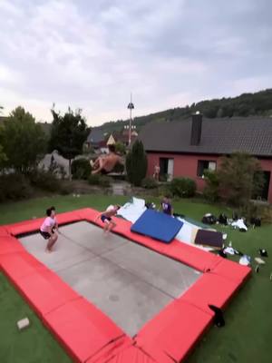 A post by @radialflipz on TikTok caption: FALLING 50FT 🤯 in Germany on the best trampoline in the world! Could this be the world record? Who knows, all we know is that this was high as! Subscribe please: https://youtube.com/@RadialFlipz Check out this video for a hug: https://youtu.be/92JiZs4KtI8 Or this one: https://youtu.be/UlB9P5SD4M0 We make clothes sometimes: Https://radialflipz.com/shop We are all trained professionals with medics on standby, do not attempt to recreate any of the stunts performed in this video… However if you do want to learn them click this link - https://www.jumpacademy.online/a/2147525734/sktaoeHe Hit the bell