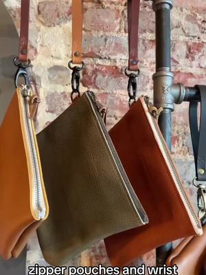 A post by @axeandawlleatherworks on TikTok caption: Zipper Pouches stocked and available online and in store🤌 #workshop #leather #leatherbag #zipperbag #firefighter #waynesvillenc #handmade 