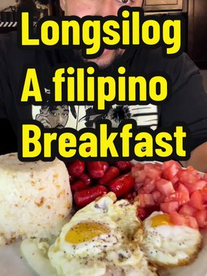 A post by @samoanfoodsurfer on TikTok caption: Longsilog for breakfast!!! Because garlic fried rice in the morning hits different!!! Ps. It took me over 6 hours to find these longganisa sausages!! So i hope theyre the right ones!!! #fyp #fypシ #foryoupage #longganisa #longsilog #filipino #filipinotiktok #tiktokfood #breakfast #friedrice #samoan #samoa 