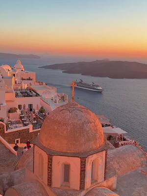 A post by @jetset_anna on TikTok caption: Golden hour in one of my favourite corners of the earth- Santorini 🇬🇷 TAG someone who you’d share thus moment with 💙 #santorini #greecetiktok #greece #traveltiktok #europe #Summer #sunset #slowtravel 