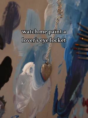 A post by @artristry on TikTok caption: painting a commissioned lover’s eye locket for valentine’s day using oils on a coat of enamel paint ❤️ #loverseyejewelry #loverseyelocket #ValentinesDay #valentinesdaygift #painting #artcommission #oilpainting 