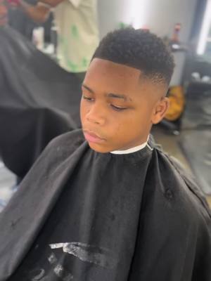 A post by @korrectkutz on TikTok caption: If you need a haircut in Tampa 🌴 area tap in 716-536-4300 or book wit the link in my intagram bio 🔒 #tampabarber #tampa #menshaircut #fade #taper #cleancut #transformation #barbershop #haircut #barbershopconnect #barberia #wesleychapel #lutz #hillsborough #orlando #brandon #miami #wahl #enchaments #barbergang #andis #babyliss #pomade #hairdesign #tampafestivalplaza #hibbetsports #goldenkrust #viral #explorepage 