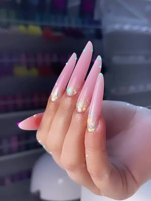 A post by @nailsbyile on TikTok caption: #nails ✨