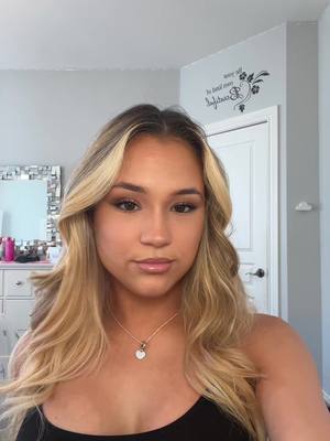 A post by @angemtl on TikTok caption: Graduation pictures glam & have you ever tried this hair hack? 