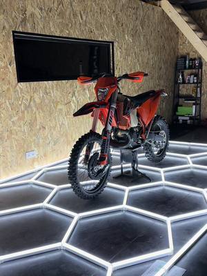 A post by @sticarz on TikTok caption: KTM 300 exc TPI de @Pierre Lnt dans notre atelier pour un Kit deco bien sympa #ktm#300#tpi#enduro#light#inspiration#kitdeco#france#france🇫🇷 