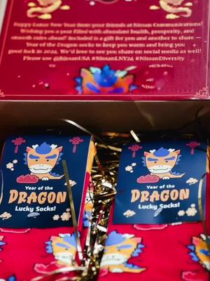 A post by @theitmom on TikTok caption: Wrapped up my first marketing activation: Lunar New Year 2024’s Year of the Dragon socks, and enjoyed every detail of it. The PR packaging turned out sooooo cute, and I’ve loved seeing it come to life throughout all the different social channels from our media frands tagging @NissanUSA and using #NissanDiversity #NissanLNY24 I’ve also learned some really interesting things about Lunar New Year and China’s rich history and culture! So here you go…you welcome.  Fun facts about the #YearOfTheDragon and #LunarNewYear 2024: When is LNY 2024? Timed to the new moon, the Lunar New Year begins on Saturday, Feb. 10 and lasts 15 days, (although it can occasionally last up to 17 days total). The dragon is considered a central figure in Chinese culture, representing vigor, strength and good fortune, among other powerful attributes. According to popular belief, babies born in dragon years possess remarkable qualities throughout their lives, including cleverness, charm, eloquence, and even wealth. People born in the year of the dragon are seen as charismatic, intelligent, confident, powerful, naturally lucky and gifted. But did you know that ancient superstition is that those whose zodiac sign is dragon should live cautiously when the year of the dragon comes? That’s because every 12 years is the year when your own zodiac sign matches up with that of the current year. On February 10, we enter the Year of the Dragon. Unfortunately, that means more disruptions and changes could happen to those who were born in Dragon years. Not everything is negative, though —- switching jobs, getting married, giving birth, or attending more happy events can lure more positive energy. It goes along with the old Chinese proverb: “One fortunate event would cancel out three disasters.” What do you wear for LNY? You’re not wrong if you wear a NEW set of clothes that are red or gold in color. The key word here is NEW. In Chinese culture, buying and wearing new clothes to welcome the lunar new year symbolises a fresh start. New clothes are represent a clean slate and help usher in plenty of good fortune in the coming year. With that, Nissan has sent out red and gold dragon socks as something new to wear on Lunar New Year for our media friends to usher in good fortune! 🐉 #capcut 