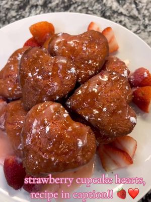 A post by @dineinwithdenise on TikTok caption: Part 3 | Strawberry Cupcake Hearts!! 🍓❤️ This is super easy and delicious and a great option if you’re not into baking! The homemade icing is just 🤌🏾🤌🏾 Ingredients: -white cake mix -1 cup mashed strawberries  -1 cup oil -1/2 cup milk -4 eggs  -strawberry jello Icing: -1/2 stick of butter  -3/4 cup powdered sugar -1/4 cup juice from mashed strawberries bake at 350 for 20-25 mins (: #vday #Love #valentinesdaydinner #valentinesmeal #strawberrycupcakes #easydessert 