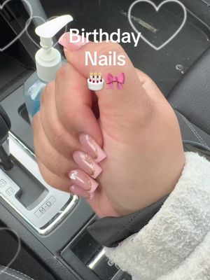 A post by @krystalskay on TikTok caption: Getting my nails done for my birthday #nails #comewithme #salon #acrylic #hearts #pinknails #valentinesdaynails 