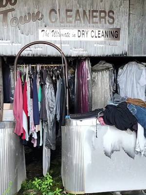 A post by @the_sparkler_ on TikTok caption: Abandoned dry cleaners with wedding dress left behind #abandoned #urbex #drycleaners  #urbanexploring  #abandonedplaces #exploring #explore #exploringabandonedplaces #history #historytime #historybuff #deserted #desertedplaces #photographyeveryday #photography #architecture #adventure #fyp #foryoupage #tiktok #viralvideo #viral #nostalgia 