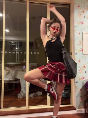 A post by @mae_mondin on TikTok caption: Just slayin cuz I can #fashion #OOTD #blackandred 