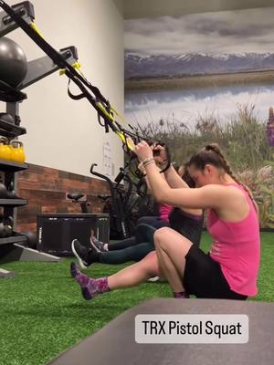 A post by @skate_a_basketball on TikTok caption: TRX Pistol Squats are one of my favorite exercises!! 👏🏼 The TRX is there to help you balance and also to give you some extra support to get back up. If you really want to feel the exercise in your quads try not to use your arms to pull you up, but really focus on planting your foot into the ground and pushing up with just your leg. You shouldn’t have to pull too hard on the Trx 😁👍🏼 #trx #trxworkout #pistolsquat #gym #fitness #fitnessmotivation #gymmotivation #gymworkout #reels #trending #gymgirl 