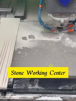 A post by @hongyuntilecutter on TikTok caption: Stone working center for processing basin holes! The efficiency is three times that of manual labor, and the price is affordable.#stoneworkingcenter #workingcenter #cnccontouringcenter #stonemachinery 