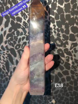 A post by @hq.aka.hollie on TikTok caption: Huge fluoride tower #bargain #new #crystals #fluoride #towers #rainbows 