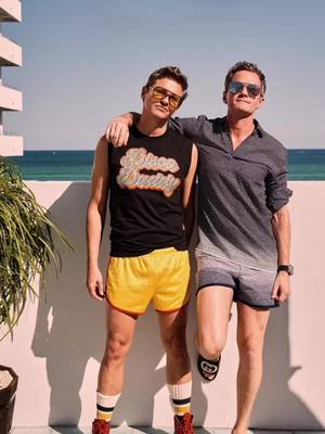 A post by @neilpatrickharris on TikTok caption: Another fun trip to Miami!! David and I loved getting to eat, drink 🤎 🍸 , dance, & selfie with so many of you.  #sobewff #wsouthbeach #foodiecon  #thomasashbourne 