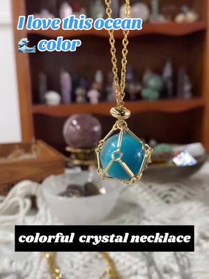 A post by @highland_crystal_select on TikTok caption: I love this ocean color necklace. #crystal #crystals #crystalnecklace #crystaljewelry #opalite #crystalhealing #crystalshop #crystalgift #crystalsale #crystalsoftiktok #highlandcrystal 