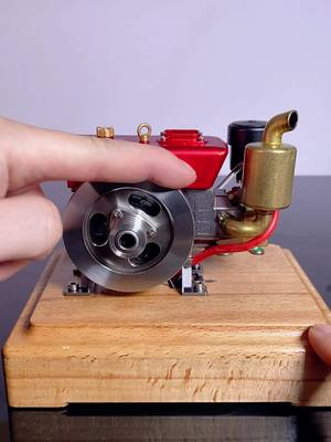 A post by @glighterll on TikTok caption: MUSA 1/8 2.6cc Mini Single-Cylinder Gas Powered Motor 4-Stroke Engine Model#engine 