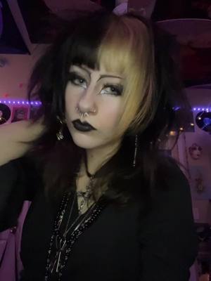 A post by @wetgrandma1 on TikTok caption: spud ^_^    #goth #fyp #hair #makeup 