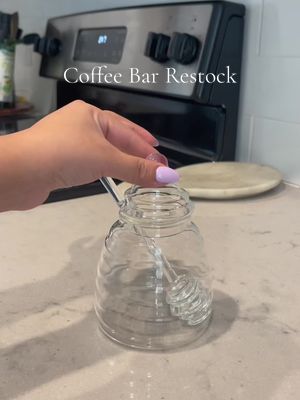 A post by @izzzbeth on TikTok caption: Coffee bar restock ☕️ #coffee #restock #asmr #satisfying #fypsounds #fyp 