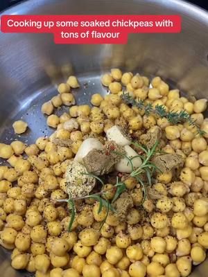 A post by @datriesmom on TikTok caption: Cooking chickpeas for some chickpea fritters, and using the aqua faba for hummus tommorow!  #cooking #food 