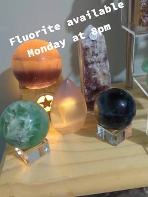 A post by @hq.aka.hollie on TikTok caption: Fluorite collection #crystals #fluorite  #candy #rainbow #raw #polished #sphere #tower #carving #crystaltok #crystalshop #minerals #fyp #SmallBusiness #crystallover 