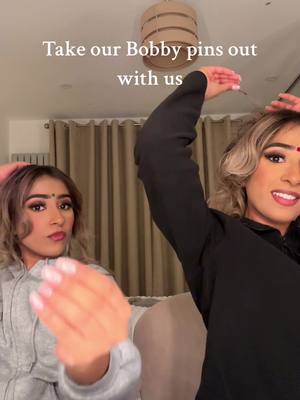 A post by @latiftwins on TikTok caption: Taking our bobby pins out bridal bun edition asmr🫢 #asmr #getunreadywithme #gurwm #bridalhair #twins 