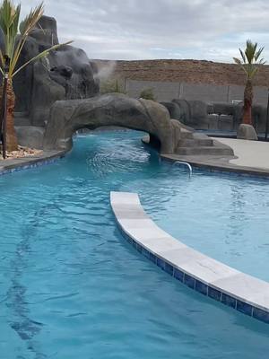 A post by @frederick on TikTok caption: Cool backyard? You agred?  #backyardpool #lazyriver #paradeofhomes #utahhomes #luxurypool 