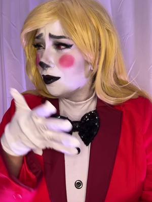 A post by @pandaide on TikTok caption: Tell me this audio isnt them. You cant. #charliemorningstar #alastor #charliemorningstarcosplay #alastorcosplay #hazbinhotel #hazbinhotelcosplay 