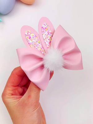 A post by @miss.o.crafts on TikTok caption: 🐰🎀✨ Elevate your Easter style with our adorable Pinch Bunny Hair Bow! 🌷🐇💖✂️ Craft your own with ease using Hair Bow Template # 154, available now on our website! 🛍️ Don't miss out – hop over and start creating your perfect Easter accessory today! 🌟🐣 #EasterHairBow #PinchBunnyBow #Crafting #HairAccessories 🌸🎉