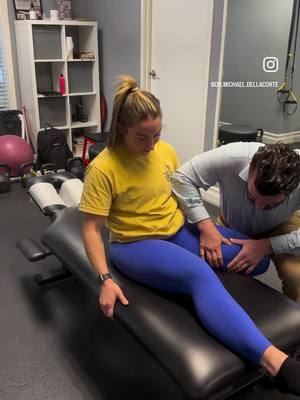 A post by @dr.michael.dellacorte on TikTok caption: Trying to help Patellar tendon pain by improving relative motion between the Vastus Intermedius & the Rectus Femoris with Active Release Technique (ART).  @jennyruttskii #activereleasetechnique #sportschiropractic #patellartendinopathy #kneepain 