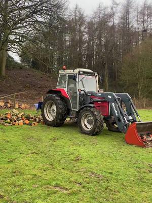 A post by @farm_hub_ on TikTok caption: Takes the half painted bucket 🫳 #agrispec #rearsteer🥵 #tractor #agriculture #country #yfc #farming #farmhub #silage #ag #logs #CapCut #masseyferguson #390t 