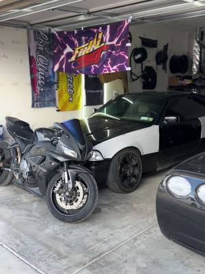 A post by @visionarycars on TikTok caption: Sunday garage cleaning and tucking everything away for the week ✅ #garage #corvette #driftcar #drifting #bmw #e36 #rays #housegoals 