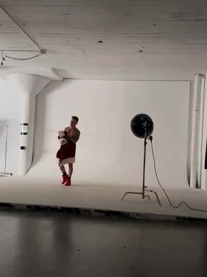 A post by @festivalfashion on TikTok caption: Follow for more! | Rising to the occasion (quite literally!) in these fiery red trunks! Behind-the-scenes sneak peek. 🔥 Explore my Amazon store to grab this style or drop a comment for a surprise! #LinkinBio🚀👟 #MaleModel #joeywsuarez #joeysuarezmodels #modeljoeysuarez