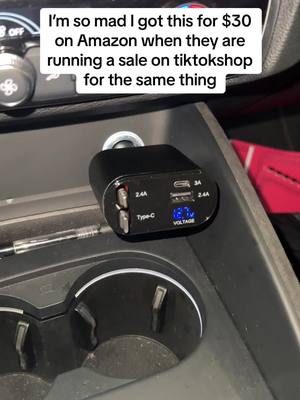 A post by @realthedeals on TikTok caption: Retractable car charger is pretty neat tho my car looks clean now #carcharger #car 