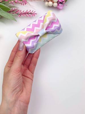 A post by @miss.o.crafts on TikTok caption: 💕🎀 Create a stylish wallet with a cute bow! 🌟Explore crafting and get the template on my website to join the fun. ✨Let's make trendy accessories for your kids together! 🎀🥰 #DIYWallet #PinkPerfection #TikTokShop #CraftingStyle #CricutCrafting #diyvalentine #ValentinesDayCrafts #diyproject #cricutprojects #cricutprojectideas #fauxleatherbows #FauxLeatherGoodness