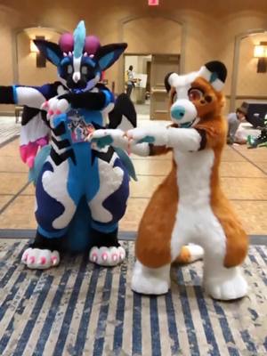 A post by @worm_soup on TikTok caption: I was so excited to do this with @Stellar | Dutchie ✨ 🔜 ??? This is harder than it looks in full suit 😭 #furry #furryfandom #fursuit #tff2024 #fursuiter #furrytiktok 