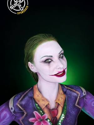 A post by @madeyewlooklex on TikTok caption: #SuicideSquadGameSponsored It was such an honor to be able to paint myself inspired by The Joker in Suicide Squad: Kill the Justice League! The attention to detail is outstanding. @Suicide Squad Game is now available on PlayStation 5 and other platforms. Link in my bio! 