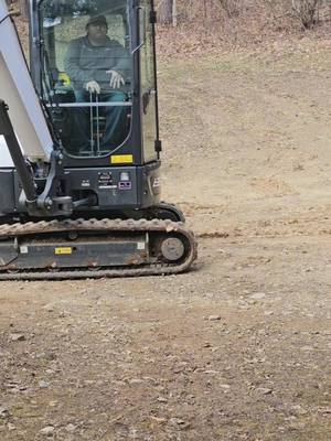 A post by @1badgt350 on TikTok caption: Let's line 'em up, 3.7mph top speed!#bobcatequipment #miniexcavator 