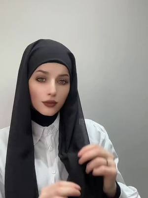 A post by @fatima.al.shamiya on TikTok caption: #جيفارا_العلي #تسريحات_شعر_بسيطة_رائعة #تسريحات #حجابي_سر_سعادتي #حسابات_تيك_توك #محجبات_انيقات☁🤍 