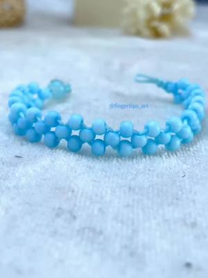 A post by @fingertips_art on TikTok caption: How to make a bracelet#bracelet #handwork #accessories #DIY #necklace #tutorial #easydiy #beadjewlery #diybracelet 