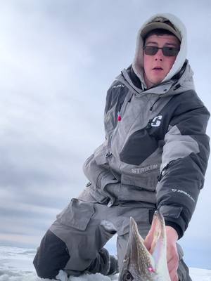 A post by @rjaminnesoda on TikTok caption: One of the many big ones so far this year #fishing #pikefishing #fish #fishtok #mn #mnfishing #pike #icefishing #minnesota 