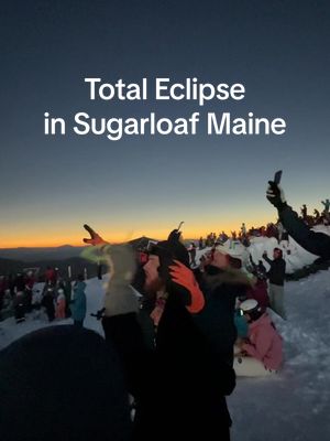 A post by @carolinecray on TikTok caption: Totality at the summit of Sugarloaf was unreal. Easily one of the best days of my life.  #eclipse #solareclipse #totality #sugarloafmountain #sugarloaf #sugarloafmaine #april8 #totality #sunandmoon #skitok #skiing @Sugarloaf 