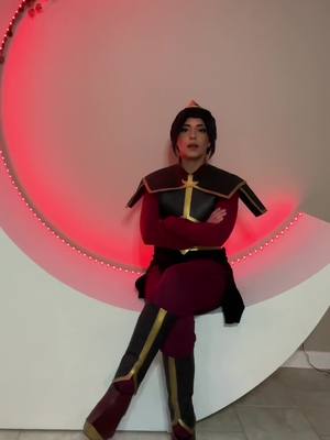 A post by @namiicos on TikTok caption: Leaked footage of Azula waiting for the Avatar during the eclipse 🌙 Azulas a kpoppie??? 🤔🤔🤔 #eclipse #avatarthelastairbender #azula #azulacosplay #cosplayer #cosplay #kpop #twice #magnetic #illit #dayofblacksun 